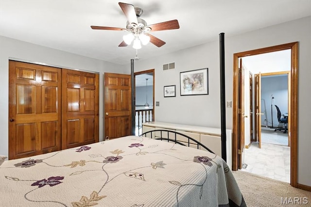 18232 Prickly Pear Ct, Pacific, MO 63069 - bedroom featuring carpet flooring, a closet, and a ceiling fan