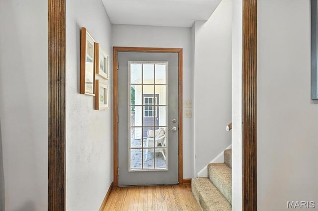 18232 Prickly Pear Ct, Pacific, MO 63069 - doorway with light wood-type flooring and stairs