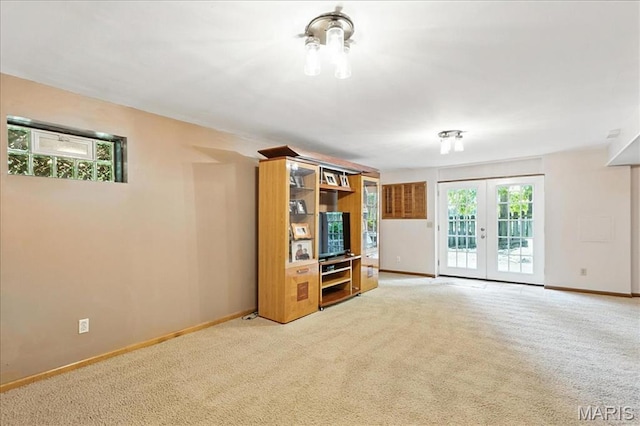 18232 Prickly Pear Ct, Pacific, MO 63069 - unfurnished living room featuring french doors and light carpet