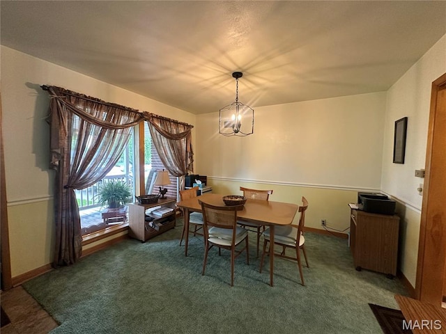 611 S Center, Shelbina, MO 63468 - carpeted dining area featuring a chandelier