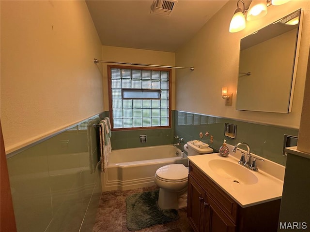 611 S Center, Shelbina, MO 63468 - full bathroom with a tub, toilet, vanity, and tile patterned floors