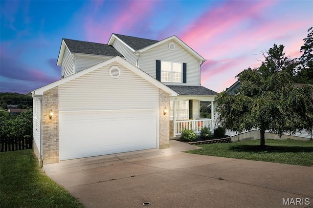 699 Olivia Ct, New Haven, MO 63068 - traditional home with concrete driveway, a porch, brick siding, an attached garage, and roof with shingles