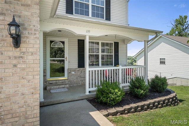 699 Olivia Ct, New Haven, MO 63068 - entrance to property with covered porch and brick siding