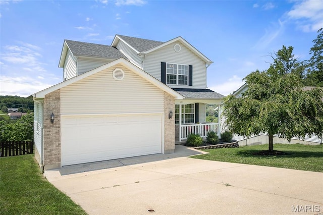 699 Olivia Ct, New Haven, MO 63068 - traditional home with concrete driveway, covered porch, brick siding, and a garage