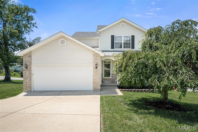 699 Olivia Ct, New Haven, MO 63068 - traditional-style house featuring concrete driveway, brick siding, an attached garage, and a front yard