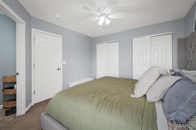 699 Olivia Ct, New Haven, MO 63068 - carpeted bedroom featuring multiple closets and a ceiling fan