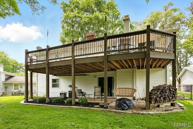 2342 Cedar Dale Ct, Maryland Heights, MO 63043 - rear view of house featuring a yard, a wooden deck, a patio area, and a chimney