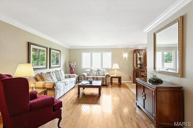 2342 Cedar Dale Ct, Maryland Heights, MO 63043 - living room featuring ornamental molding, light wood finished floors, and baseboards