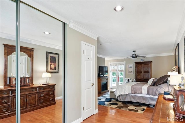 2342 Cedar Dale Ct, Maryland Heights, MO 63043 - bedroom featuring light wood-type flooring, crown molding, baseboards, and recessed lighting
