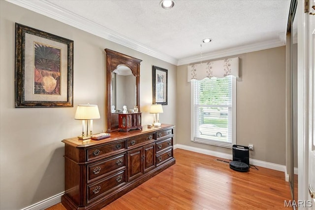 2342 Cedar Dale Ct, Maryland Heights, MO 63043 - corridor with baseboards, light wood finished floors, crown molding, a textured ceiling, and recessed lighting