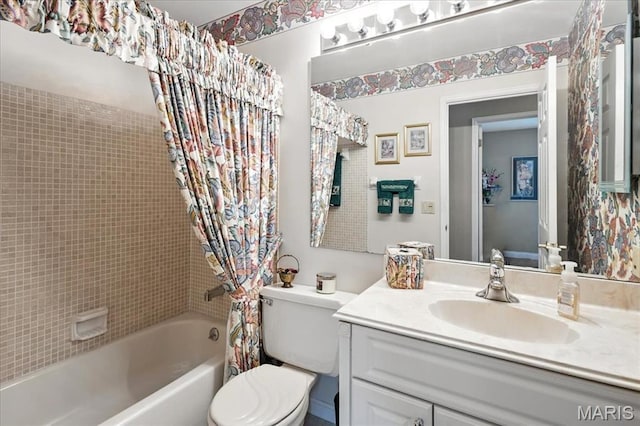 2342 Cedar Dale Ct, Maryland Heights, MO 63043 - bathroom with shower / bathtub combination with curtain, toilet, and vanity