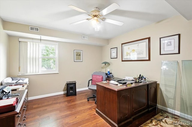 2342 Cedar Dale Ct, Maryland Heights, MO 63043 - office with wood finished floors, a ceiling fan, and baseboards