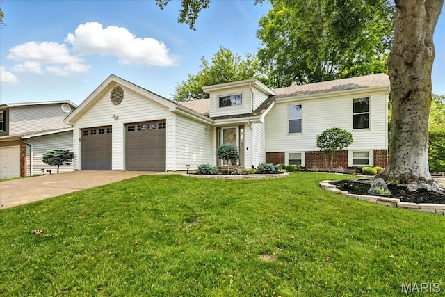2342 Cedar Dale Ct, Maryland Heights, MO 63043 - view of front of home featuring a garage, a front lawn, and driveway