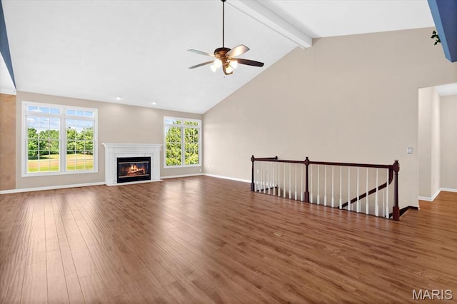 1609 10th Fairway Dr, Belleville, IL 62220 - unfurnished living room with wood finished floors, beamed ceiling, a ceiling fan, a premium fireplace, and high vaulted ceiling