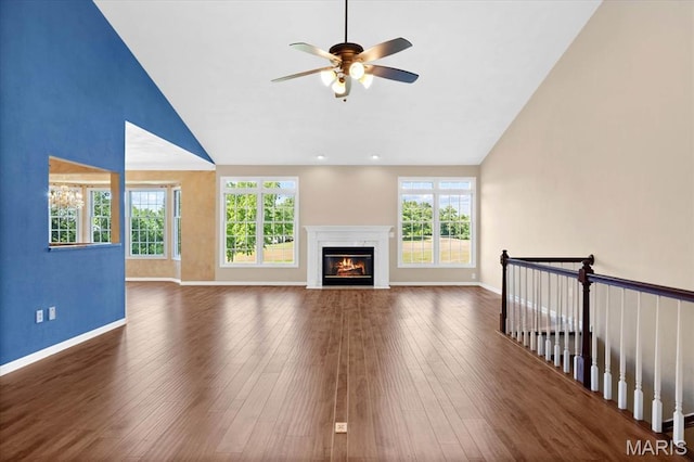 1609 10th Fairway Dr, Belleville, IL 62220 - unfurnished living room with ceiling fan, high vaulted ceiling, a premium fireplace, plenty of natural light, and hardwood / wood-style floors