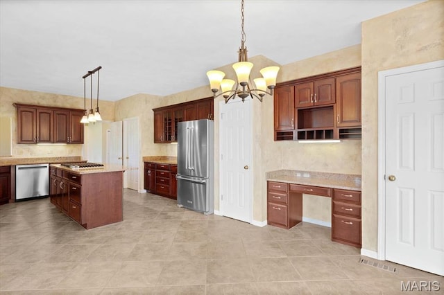 1609 10th Fairway Dr, Belleville, IL 62220 - kitchen featuring stainless steel appliances, a chandelier, light tile patterned floors, and decorative light fixtures