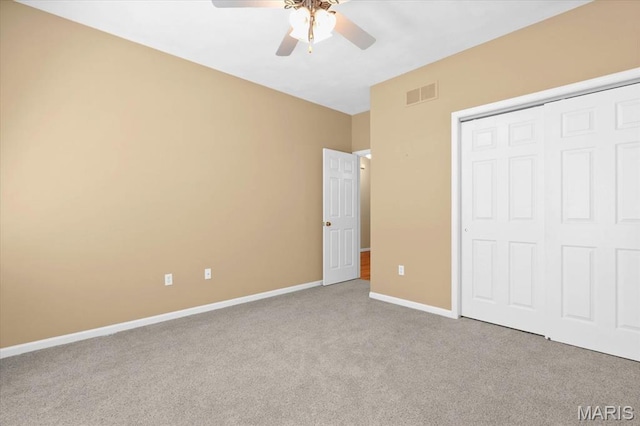 1609 10th Fairway Dr, Belleville, IL 62220 - unfurnished bedroom with carpet floors, a closet, and a ceiling fan