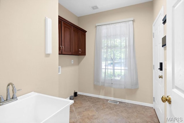 1609 10th Fairway Dr, Belleville, IL 62220 - laundry area with hookup for a washing machine and cabinet space
