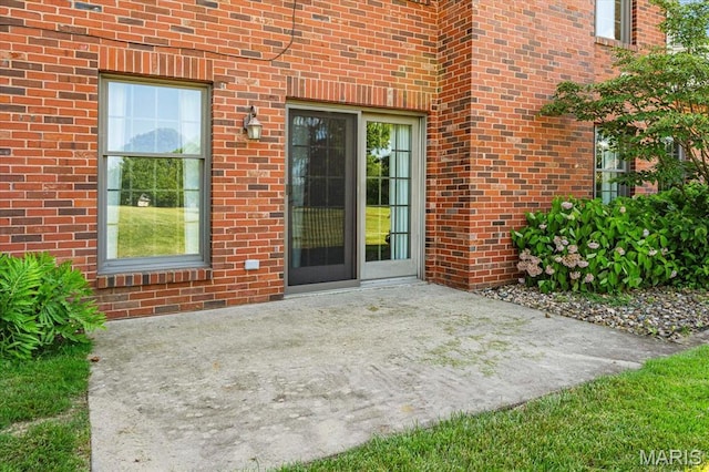 1609 10th Fairway Dr, Belleville, IL 62220 - entrance to property featuring a patio and brick siding