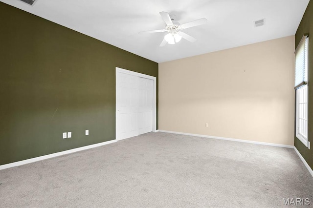 1609 10th Fairway Dr, Belleville, IL 62220 - unfurnished bedroom with carpet floors, a closet, and a ceiling fan
