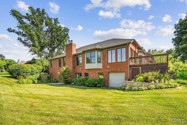 1609 10th Fairway Dr, Belleville, IL 62220 - rear view of house featuring brick siding, a chimney, a lawn, a garage, and a deck