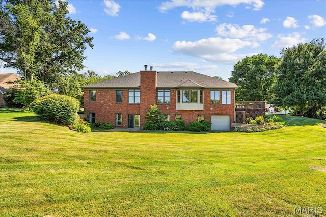 1609 10th Fairway Dr, Belleville, IL 62220 - rear view of property with brick siding, an attached garage, a yard, and a chimney