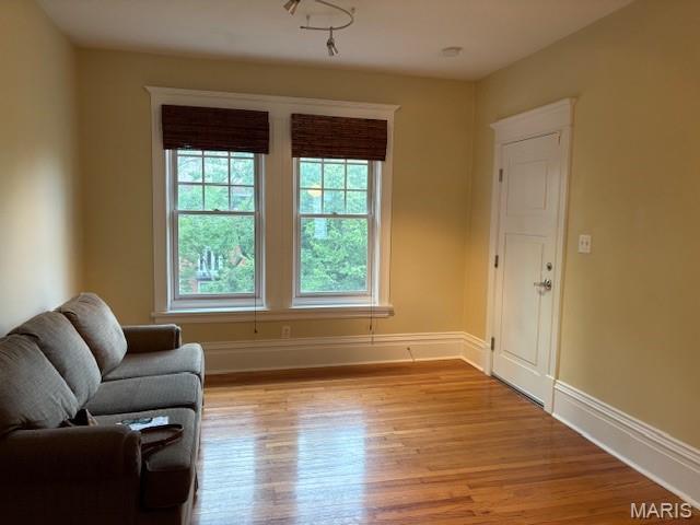 6114 Washington Blvd Unit 302, Saint Louis, MO 63112 - unfurnished room featuring light wood-type flooring and baseboards