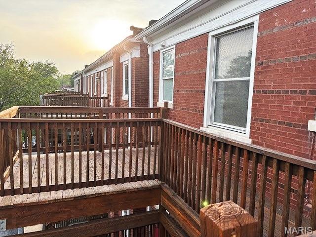 6114 Washington Blvd Unit 302, Saint Louis, MO 63112 - view of wooden deck