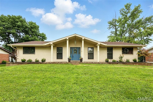 5839 Pebble Oak Dr, Saint Louis, MO 63128 - ranch-style house with brick siding and a front yard