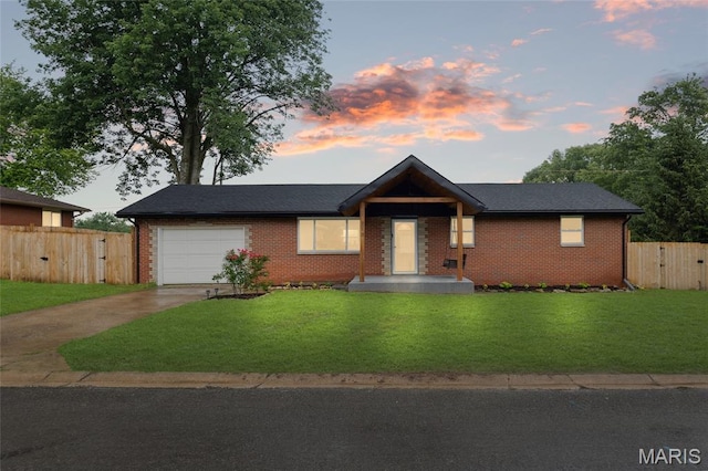 713 Fairway St, Bethalto, IL 62010 - single story home with concrete driveway, brick siding, an attached garage, and a gate