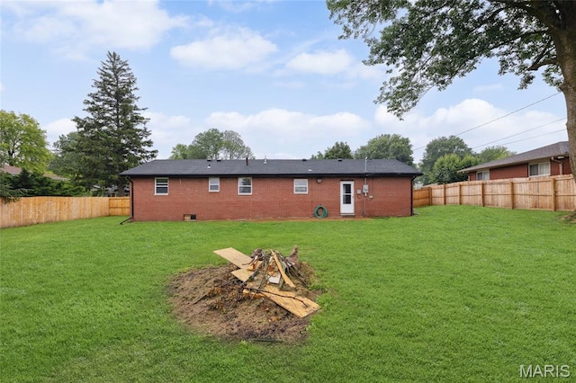 713 Fairway St, Bethalto, IL 62010 - rear view of property featuring a fire pit and brick siding