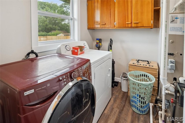 713 Fairway St, Bethalto, IL 62010 - washroom with cabinet space, washer and clothes dryer, and dark wood finished floors