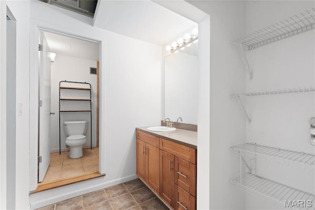 507 N 13th St Unit 207, Saint Louis, MO 63103 - bathroom with vanity and tile patterned flooring