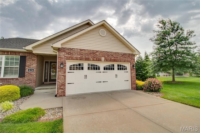 426 Vancroft Pl, Ofallon, IL 62269 - view of front of house with brick siding, an attached garage, concrete driveway, and a front lawn