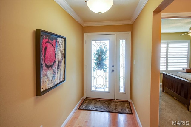 426 Vancroft Pl, Ofallon, IL 62269 - entryway featuring plenty of natural light, ornamental molding, wood finished floors, and ceiling fan