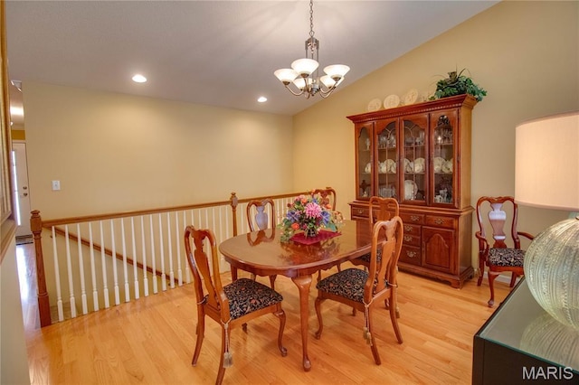 426 Vancroft Pl, Ofallon, IL 62269 - dining area featuring a chandelier, light wood-style floors, vaulted ceiling, and recessed lighting
