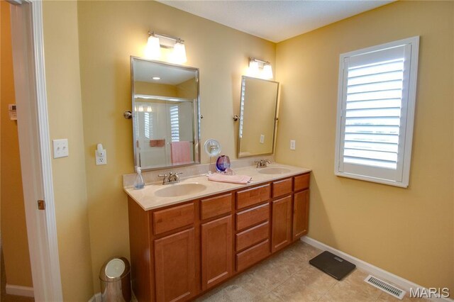 426 Vancroft Pl, Ofallon, IL 62269 - bathroom with double vanity, a shower with door, and tile patterned flooring