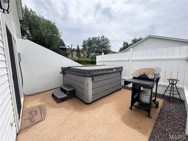 123 Clover Rd, Hannibal, MO 63401 - view of patio with a hot tub