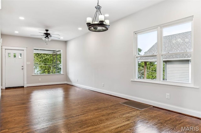 7721 Weaver Ave, Maplewood, MO 63143 - unfurnished room featuring ceiling fan, baseboards, a chandelier, wood finished floors, and recessed lighting
