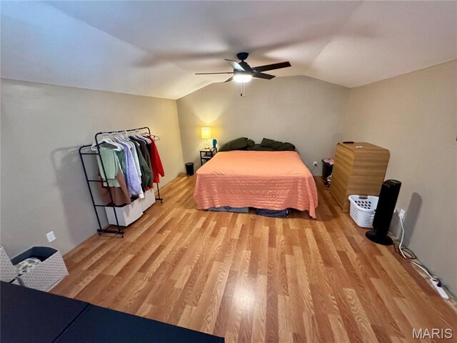 29048 State Highway V, Maywood, MO 63454 - bedroom featuring light wood-type flooring, vaulted ceiling, and a ceiling fan