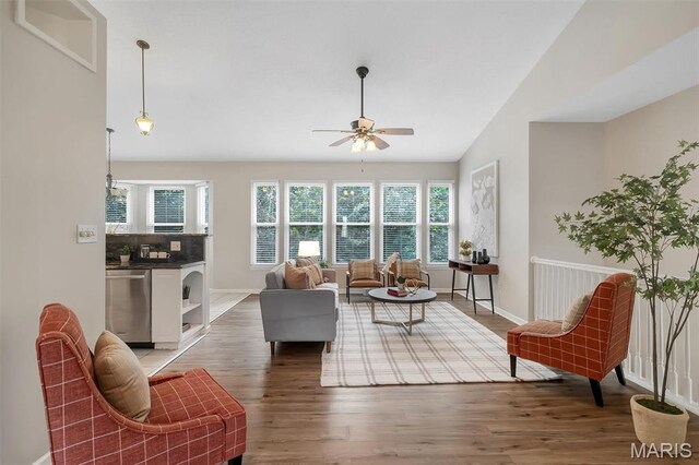 3001 Peach Blossom Ct, High Ridge, MO 63049 - living room with ceiling fan, wood finished floors, and vaulted ceiling