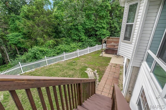 3001 Peach Blossom Ct, High Ridge, MO 63049 - fenced backyard with a hot tub and a patio