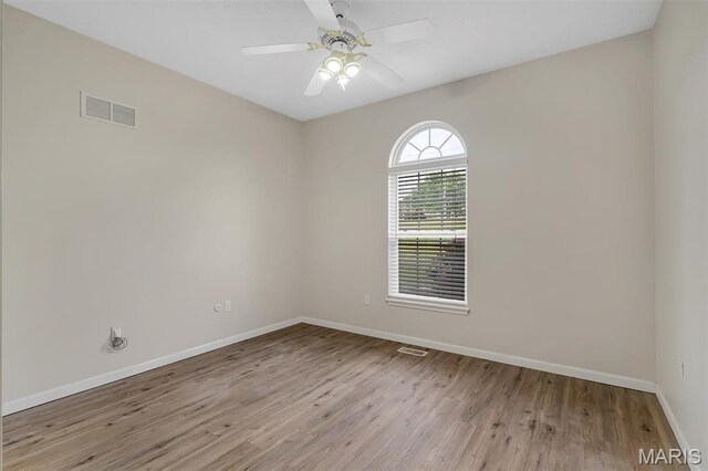 3001 Peach Blossom Ct, High Ridge, MO 63049 - unfurnished room featuring wood finished floors and a ceiling fan