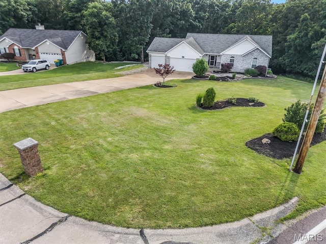 3001 Peach Blossom Ct, High Ridge, MO 63049 - view of green lawn featuring driveway and an attached garage