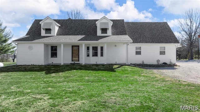2280 Ebert Ln, Wentzville, MO 63385 - new england style home with a front lawn and a shingled roof