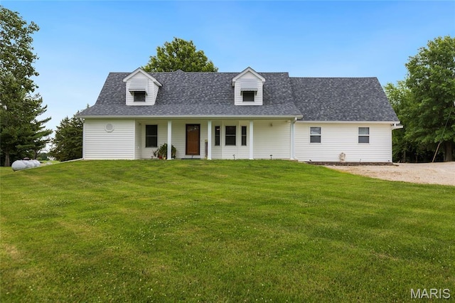 2280 Ebert Ln, Wentzville, MO 63385 - cape cod home with a porch, a front lawn, and roof with shingles