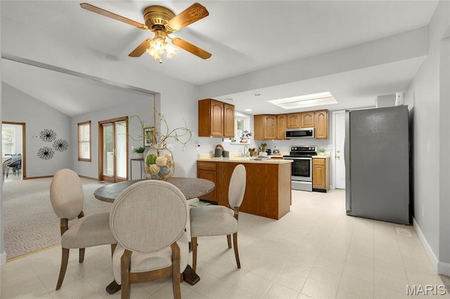 2280 Ebert Ln, Wentzville, MO 63385 - dining room featuring a ceiling fan and lofted ceiling