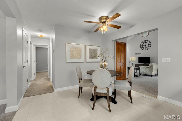 2280 Ebert Ln, Wentzville, MO 63385 - dining area with a ceiling fan and light carpet