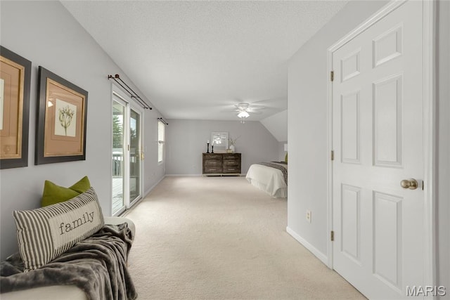 2280 Ebert Ln, Wentzville, MO 63385 - carpeted bedroom featuring access to exterior, a textured ceiling, and a ceiling fan