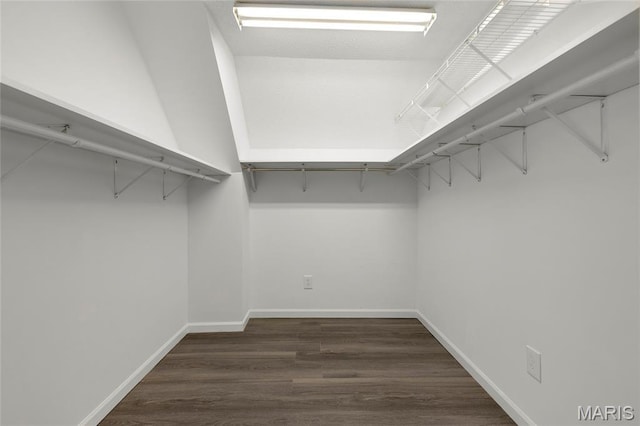 2280 Ebert Ln, Wentzville, MO 63385 - walk in closet featuring dark wood finished floors